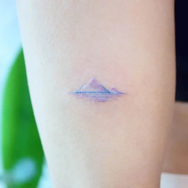 Dainty colored mountain tattoo by @tattooist_namoo